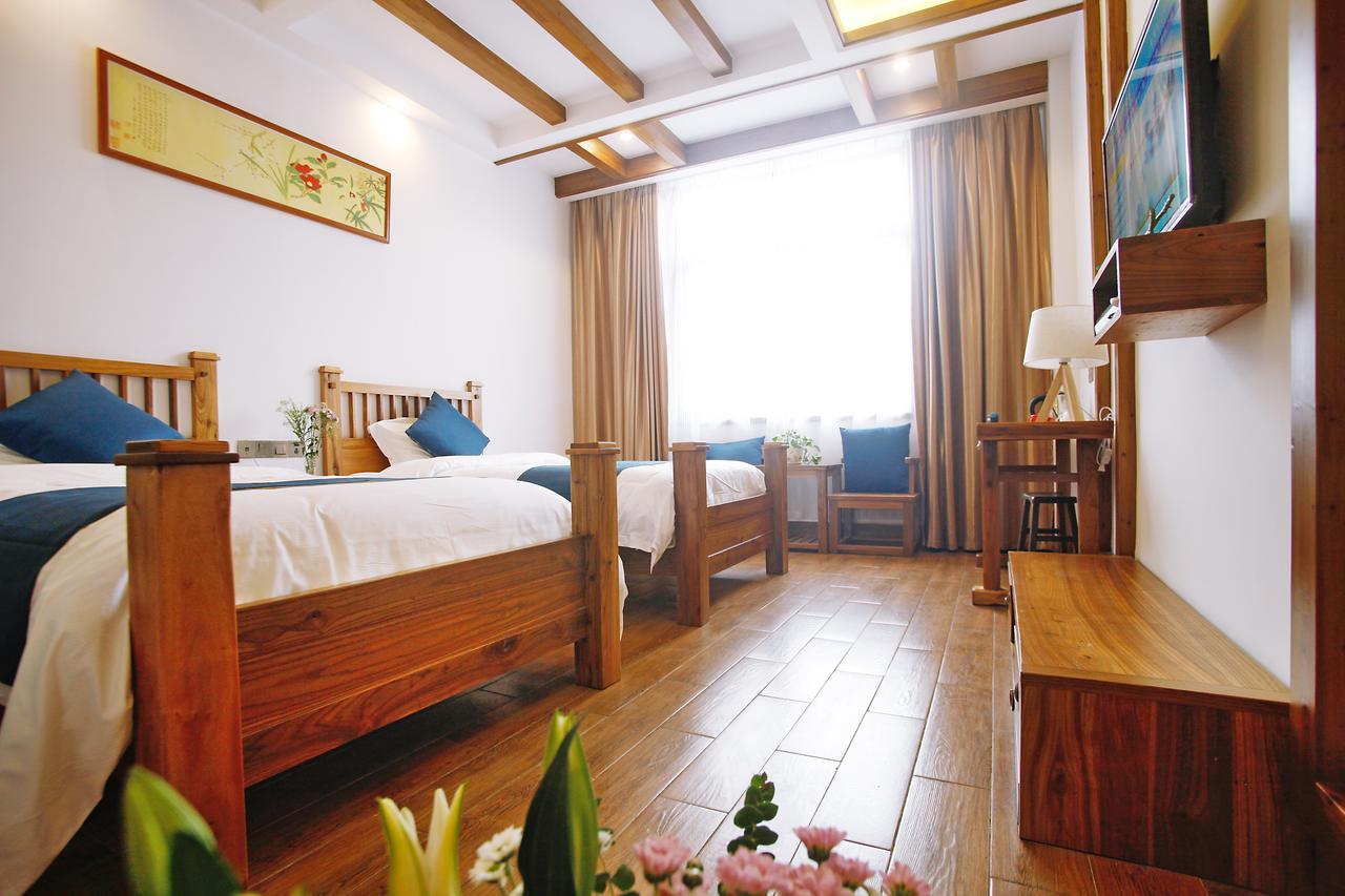 Guihua Road 106Th Hostel Zhangjiajie Exterior photo
